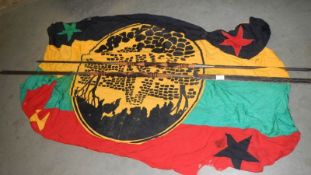 2 African double end spears and a flag.