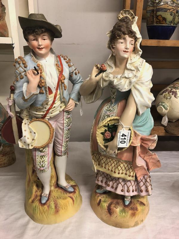 A fine large pair of continental porcelain figures, 52 cm tall.