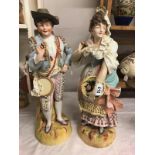 A fine large pair of continental porcelain figures, 52 cm tall.