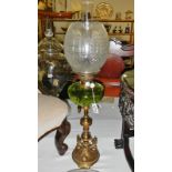 A rare medium sized Victorian oil lamp circa 1875. A round brass base standing on three small feet.