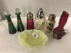 A pair of green glass scent bottles with enamel decoration, 3 sugar castors,