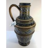 A Doulton Lambeth jug 1877 by Florence E Barlow, Emma Martin and Mary Butter and inscribing 'JB7'.