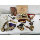 A mixed lot of vintage pipes, cheroot holders etc.