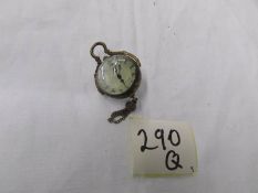 An old bubble shaped pocket watch.
