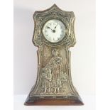 A silver fronted 1919 mother and child clock by British United Clock Co.