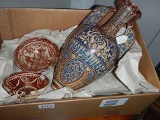 An Islamic vase and 2 dishes.