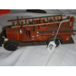 A cast iron reproduction fire engine.