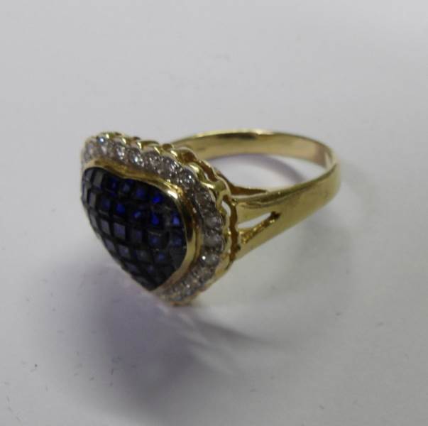 An 18ct gold sapphire and diamond heart shaped ring, size U. - Image 6 of 7