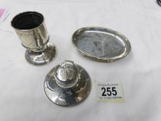 A silver inkwell, a silver pin dish and a silver toothpick holder.
