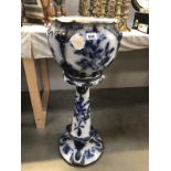 A blue and white jardiniere on stand, a/f.