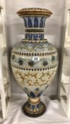 A huge Royal Doulton urn with stylised leaves mainly in blues and browns,