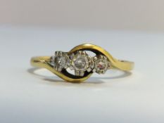 An 18ct gold ring set with 3 diamonds, hall marked Birmingham, BMS. size O.