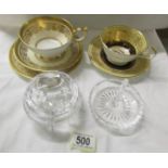 An Aynsley collector's cup and saucer, An Aynsley collector's cup,