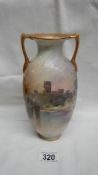 A Royal Doulton, England, Warwick Castle 2 handled vase, painted by J H Plant.