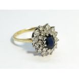 An 18ct yellow gold sapphire and diamond ring, size J half.