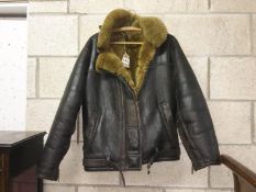 A ladies tailored leather bomber style jacket with sheepskin wool lining to fit size 12 (reputedly