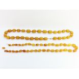 2 butterscotch amber necklaces.