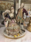 A fine 19th century porcelain figural group of a lady and gentleman, 37 cm tall.