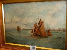 A 19th century oil on canvas painting of 2 fishing smacks off the coast - unsigned but named verso
