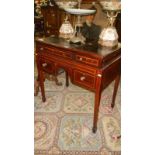 A Georgian mahogany writing desk with opening top revealing paper racks