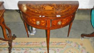 A half round marquetry table