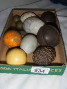 A quantity of stone eggs, old cricket balls etc.