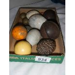 A quantity of stone eggs, old cricket balls etc.