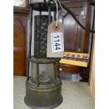 A rare early miner's lamp.