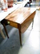 A Victorian mahogany Pembroke table.