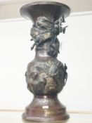 A Japanese bronze vase with marking to base.