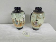 A pair of early 20th century oriental vases (one vase has painted signature? on base).