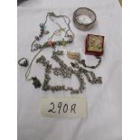 A mixed lot of jewellery including a hall marked silver cuff, boar tusk pendants and other silver.