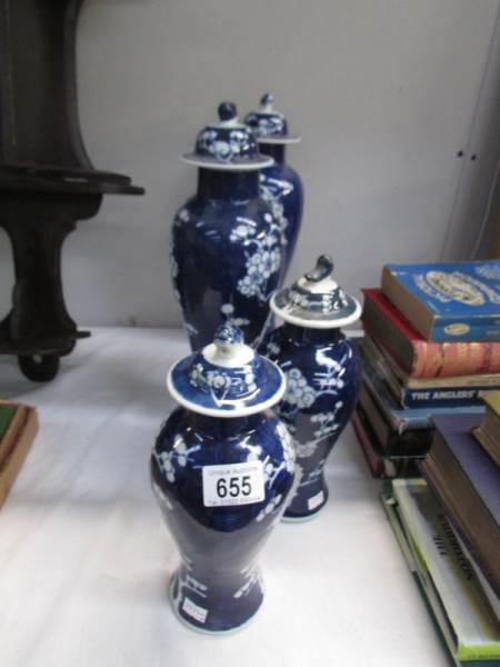2 pairs of 10.5" and a pair of 15" blue and white Chinese vases.