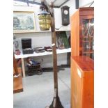 An oak lantern style floor lamp.