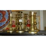 3 pairs of Georgian brass candlesticks