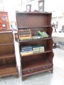 A free standing bookcase with 2 drawers.