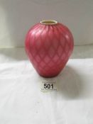 An American satin glass vase in pink, 5" tall.