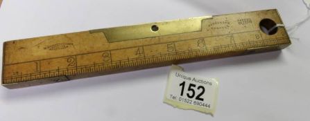 A rare Marple's 9" rule with brass fitting and incorporating 2 spirit levels.