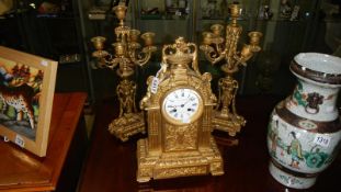 An ormolu clock set (3 piece) Le Roy,