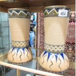 A pair of Royal Doulton vases, 6180,