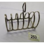 A silver toast rack.