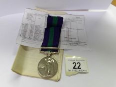 A Palestine medal with paperwork.