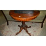 A walnut Victorian round card table