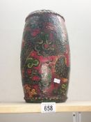 An antique painted Chinese drum.