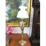 A tall Victorian brass oil lamp 1860-1900.