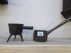 A 19th century bronze 3 leg cauldron and a cast iron Kenrick 1 pint No.1 saucepan.