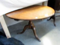 A circular oak table.