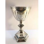 A mid 19th century silver plated chalice with monogram.