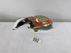 A Royal Crown Derby paperweight 'Moonlight Badger, dated 2001, gold stopper.