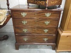 A Georgian chest of drawers (mahogany)